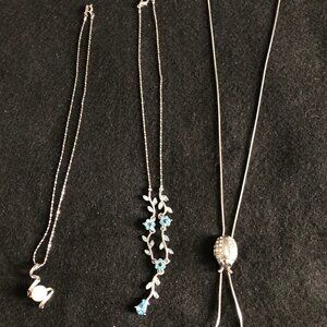 3 Pre-loved women's necklace silver tone chain with pendent very good condition